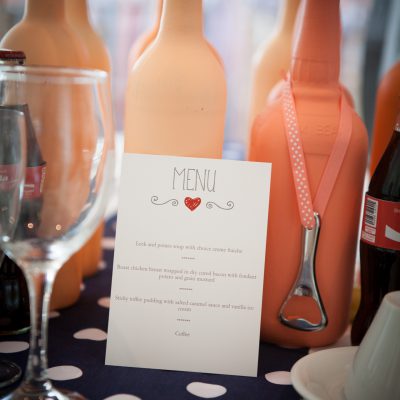 Polka dots and coral wedding decor